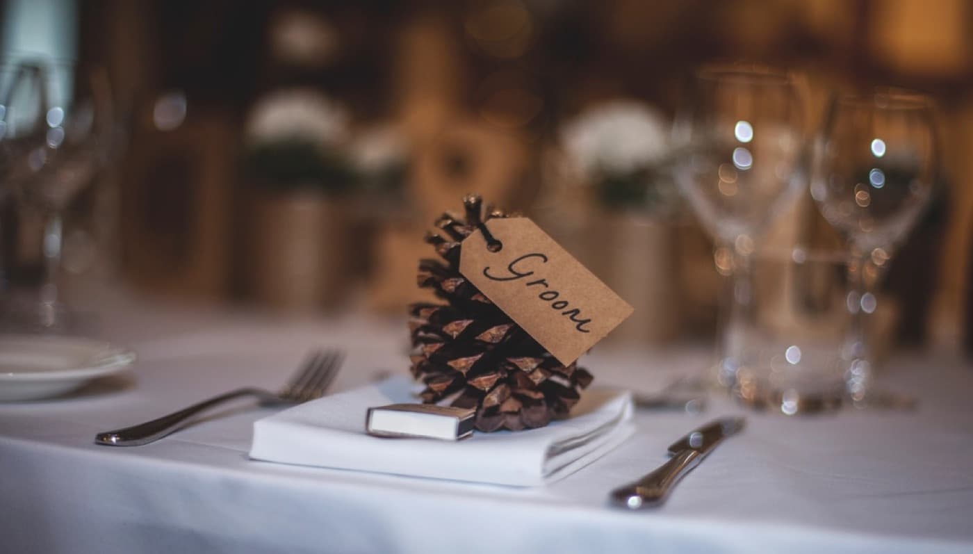 A place setting with a handwritten name card